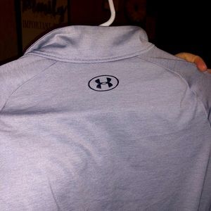 Light grey quarter zip dry fit material pullover shirt/jacket.